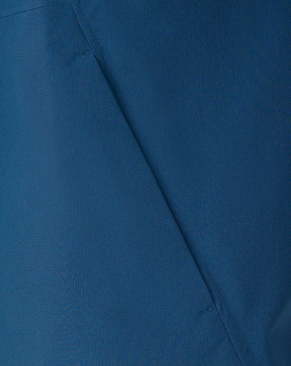 Close-up of blue fabric with a visible seam