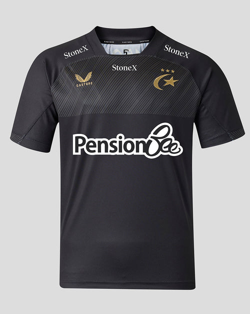 A black short-sleeve sports jersey with a subtle diagonal textured pattern across the chest. It features the white 'Pension Bee' sponsor logo across the center, 'StoneX' branding on the shoulders, and gold embroidered logos for 'Castore' and the Saracens club emblem on the chest.