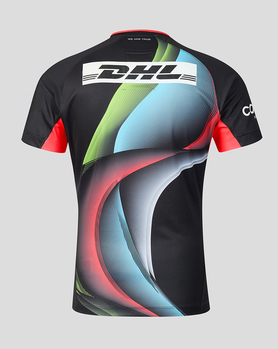 A short-sleeve athletic jersey shown from the back, featuring a black base with a large abstract wave pattern in light blue, green, and red, plus a prominent white DHL logo across the upper back.