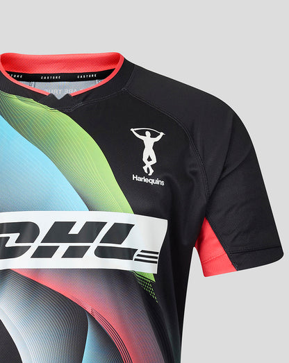 A close-up of a black athletic jersey with a colorful abstract wave pattern in green, blue, and pink, featuring a white Harlequin's logo on the chest and a large white DHL sponsor logo across the front.