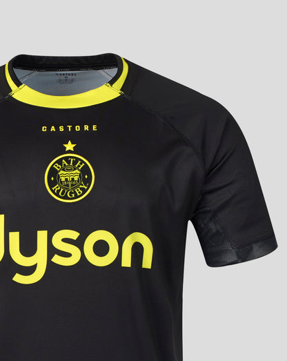 Black short-sleeve athletic jersey with a yellow collar, featuring the BATH RUGBY crest and yellow 'CASTORE' and 'Dyson' branding on a light gray background.