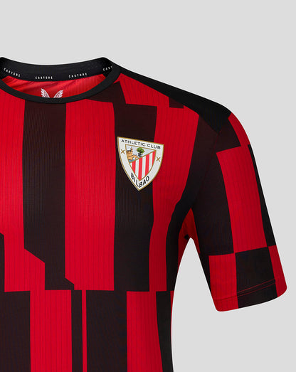 Athletic Club matchday shirt with red and black blocks and the club crest on the chest.