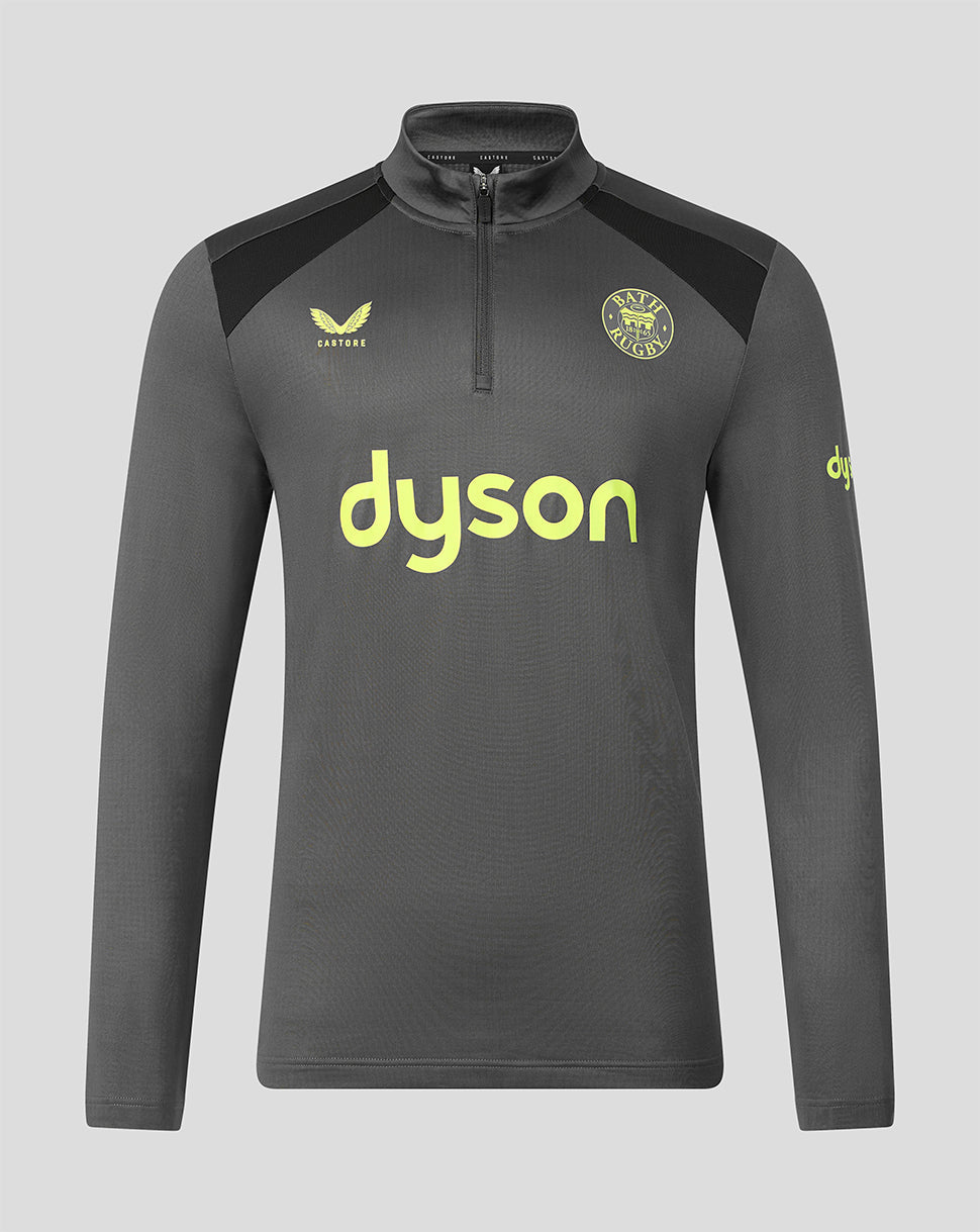A dark gray long-sleeve athletic quarter-zip pullover with a high collar, featuring a yellow Dyson logo on the chest, a yellow and black VfL Wolfsburg team crest, and a yellow Dyson logo on the sleeve, shown against a solid gray background.