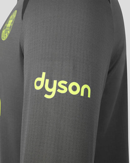 Close-up of a dark gray athletic top with a bright neon yellow-green Dyson logo printed on the chest.