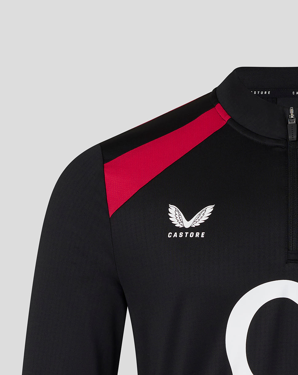 Black sports jersey with red accents and Castore logo on a gray background