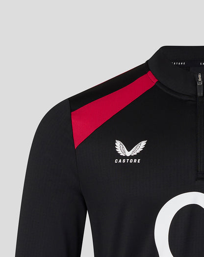 Black sports jersey with red accents and Castore logo on a gray background