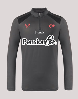 A dark gray long-sleeve athletic quarter-zip pullover with a half-placket collar, featuring the StoneX and Pension Bee sponsor logos on the front, alongside the Turkish flag emblem on the chest.