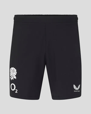 Black shorts with white logos on a gray background