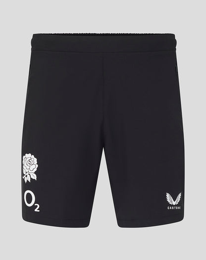 Black shorts with white logos on a gray background