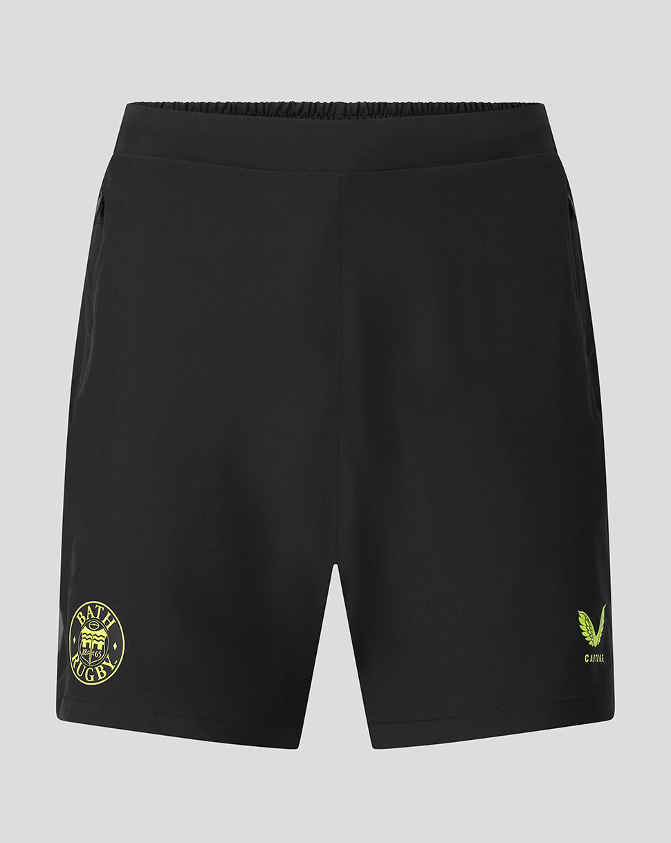 Black athletic shorts with yellow-green logo prints on the left and right legs, displayed against a neutral gray background.