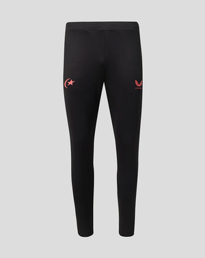 Black athletic leggings with small red logo graphics on the upper thighs, displayed on a neutral light gray background.