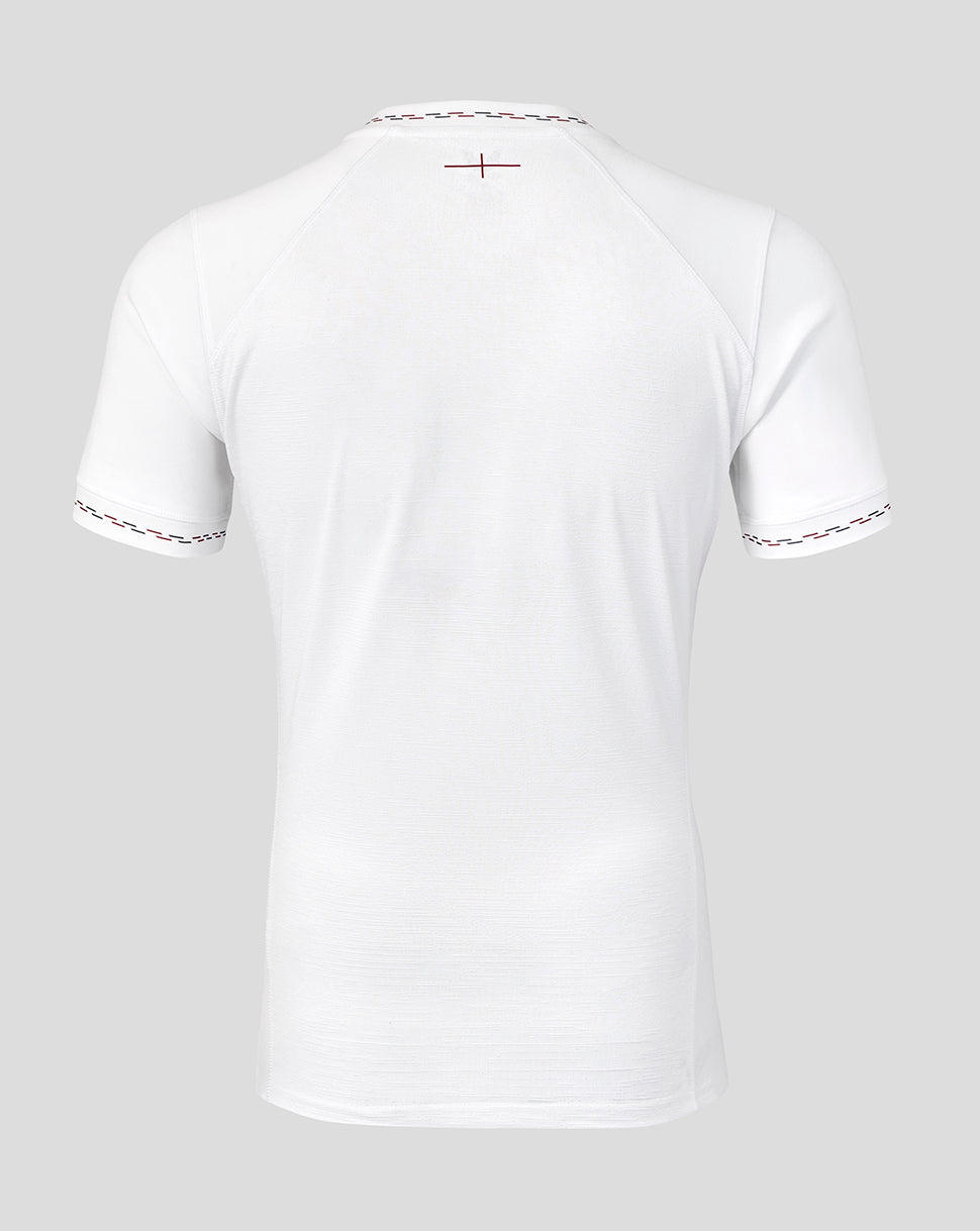 White t-shirt with red trim on a light gray background