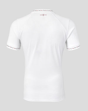 White t-shirt with red trim on a light gray background