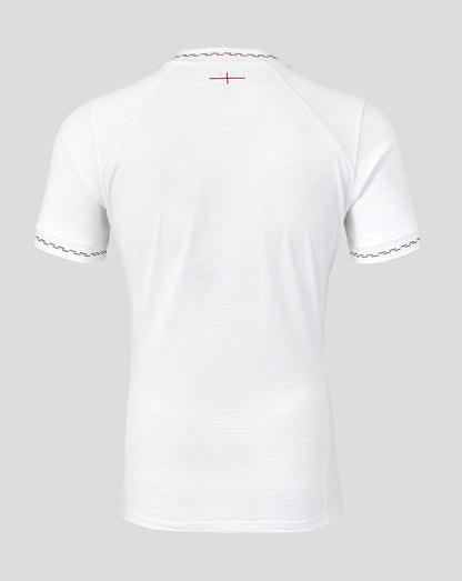 White t-shirt with red trim on a light gray background