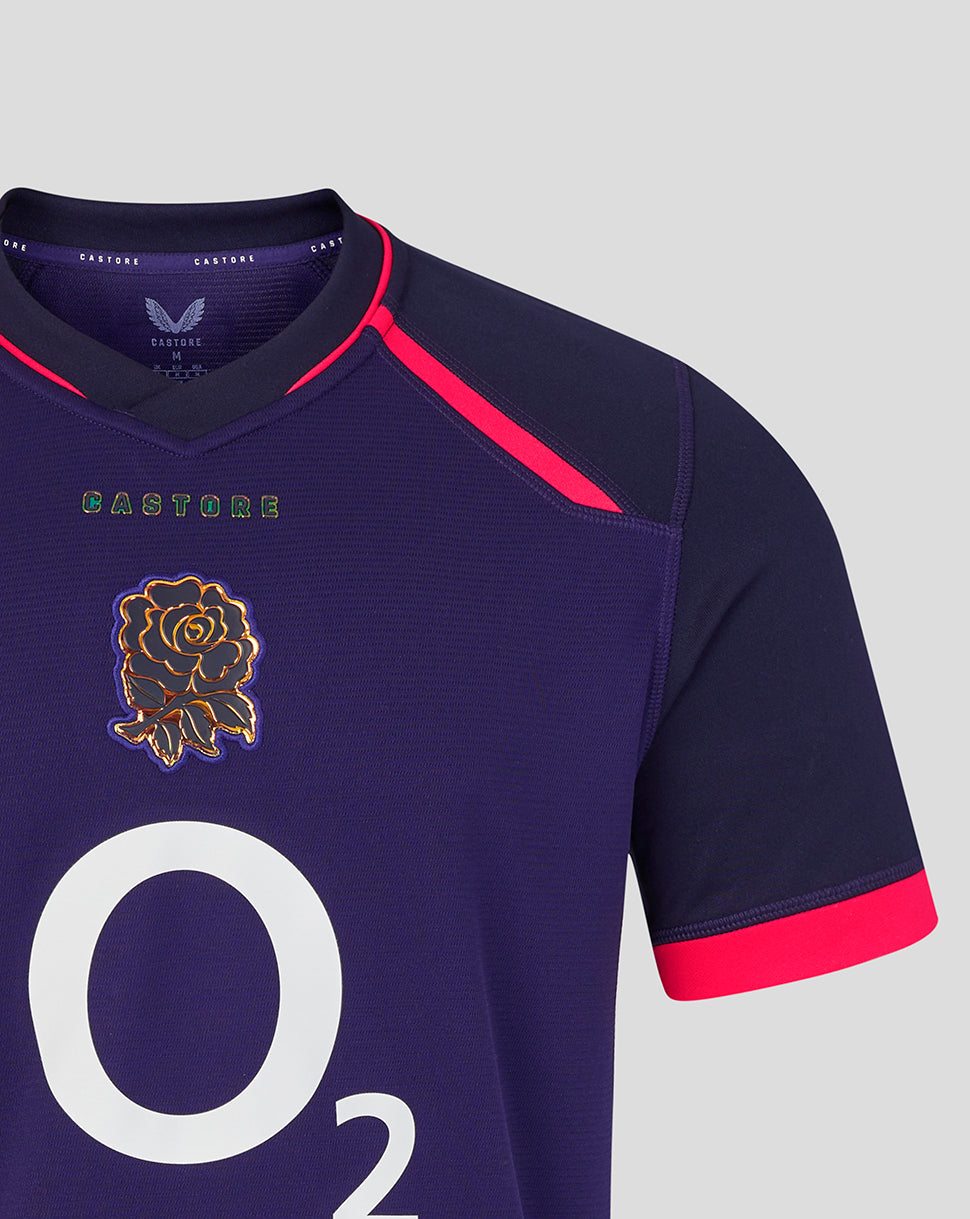 Navy sports jersey with red accents and a lion emblem on a gray background
