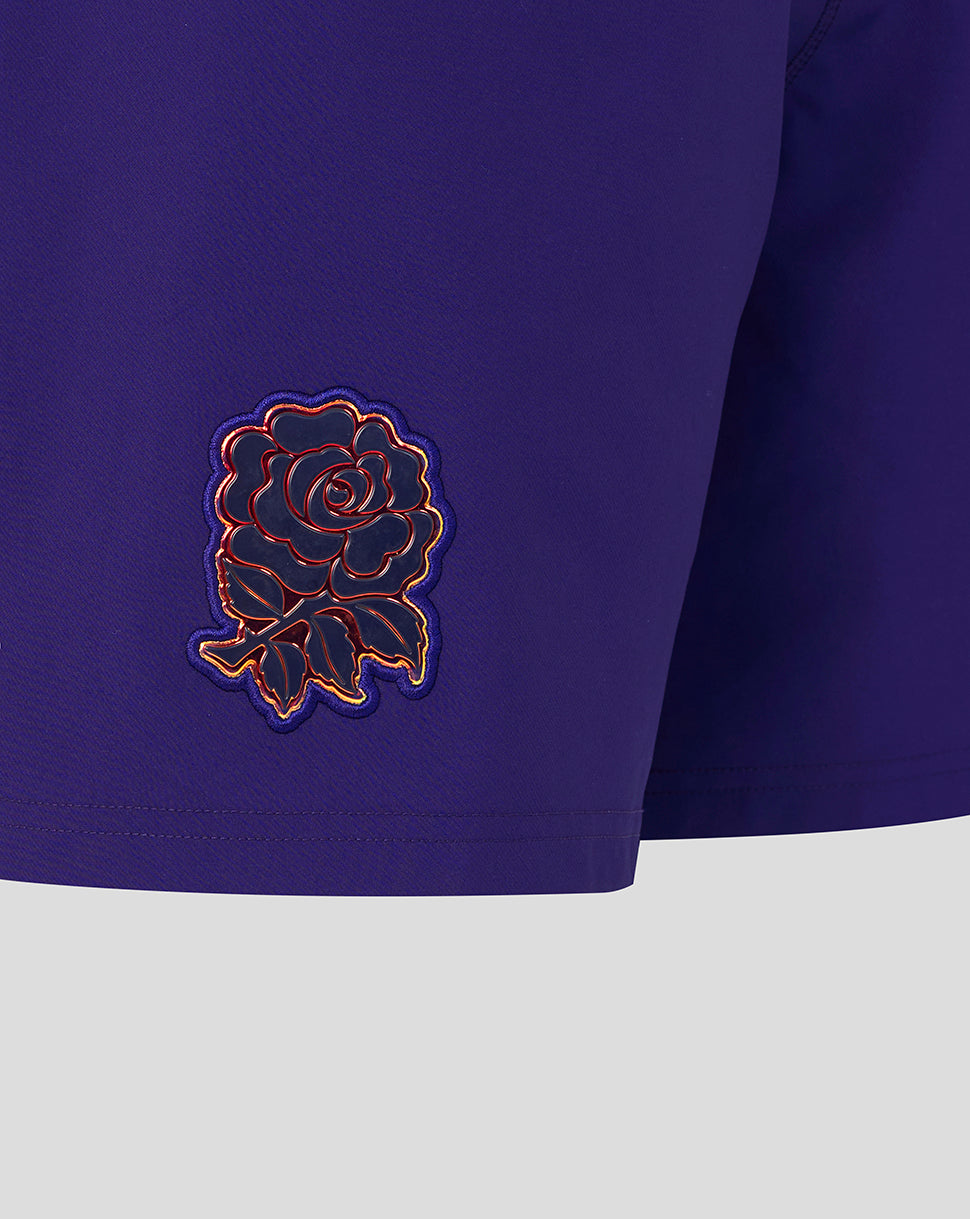 Navy blue fabric with a rose emblem on a white background