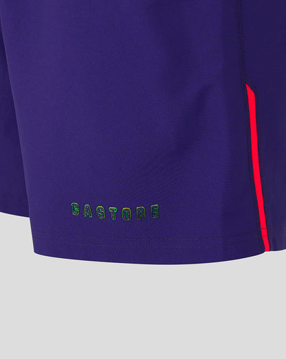 Navy shorts with a red stripe and 'CASTORE' branding on a light gray background