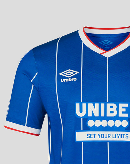 Blue sports jersey with 'Umbro' and 'UNIBE' branding on a gray background