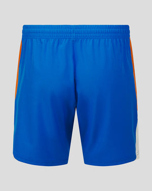 Blue shorts with orange side stripes on a gray background