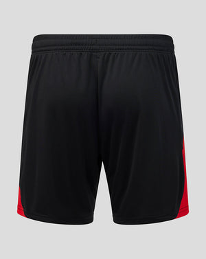 Black athletic shorts with red side panels, shown from the back on a light gray background.
