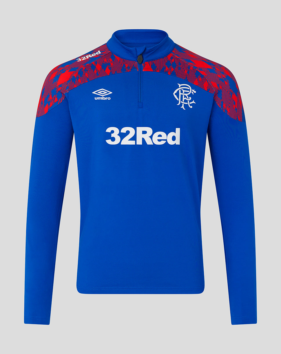 A royal blue long-sleeve half-zip training top with red patterned shoulder panels, featuring the white Umbro logo, 32Red sponsor logo, and Rangers FC crest on a light gray background.