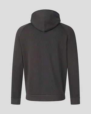 A dark charcoal gray pullover hoodie shown from the back, featuring raglan sleeves and ribbed cuffs and hem, set against a solid light gray background.