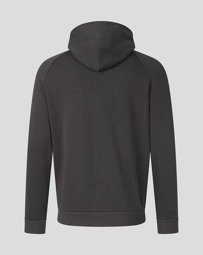 A dark charcoal gray pullover hoodie shown from the back, featuring raglan sleeves and ribbed cuffs and hem, set against a solid light gray background.