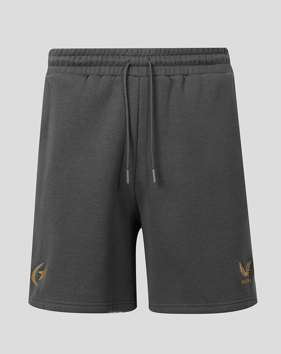 Dark gray heathered sweat shorts with a drawstring waist, featuring a gold winged logo on the left leg and a small gold 'CASTORE' brand mark on the right leg, shown against a light gray background.