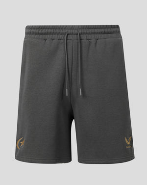 Dark gray heathered sweat shorts with a drawstring waist, featuring a gold winged logo on the left leg and a small gold 'CASTORE' brand mark on the right leg, shown against a light gray background.