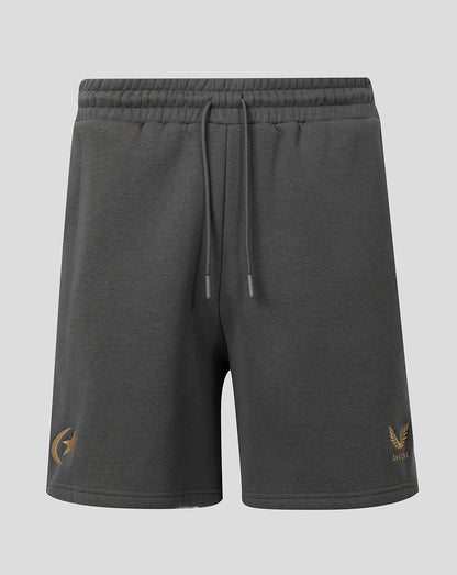 Dark gray heathered sweat shorts with a drawstring waist, featuring a gold winged logo on the left leg and a small gold 'CASTORE' brand mark on the right leg, shown against a light gray background.