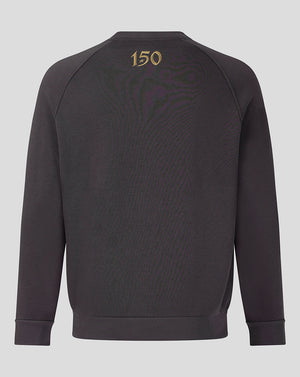 A dark gray crewneck sweatshirt shown from the back, featuring a subtle tonal graphic and the gold number '150' printed near the neckline.