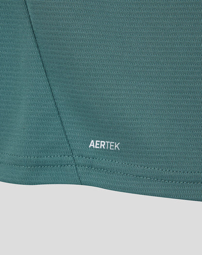 Close up of teal Everton 26/27 third shirt fabric with AERTEK branding near the hem.