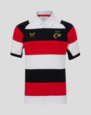 A short-sleeve rugby polo shirt with horizontal stripes of red, white, and black, featuring gold embroidered logos on the chest, displayed against a solid light gray background.