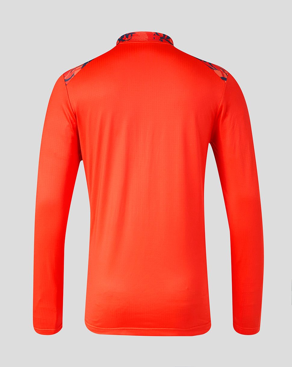 Back view of the bright orange Feyenoord third matchday midlayer with dark shoulder panels.