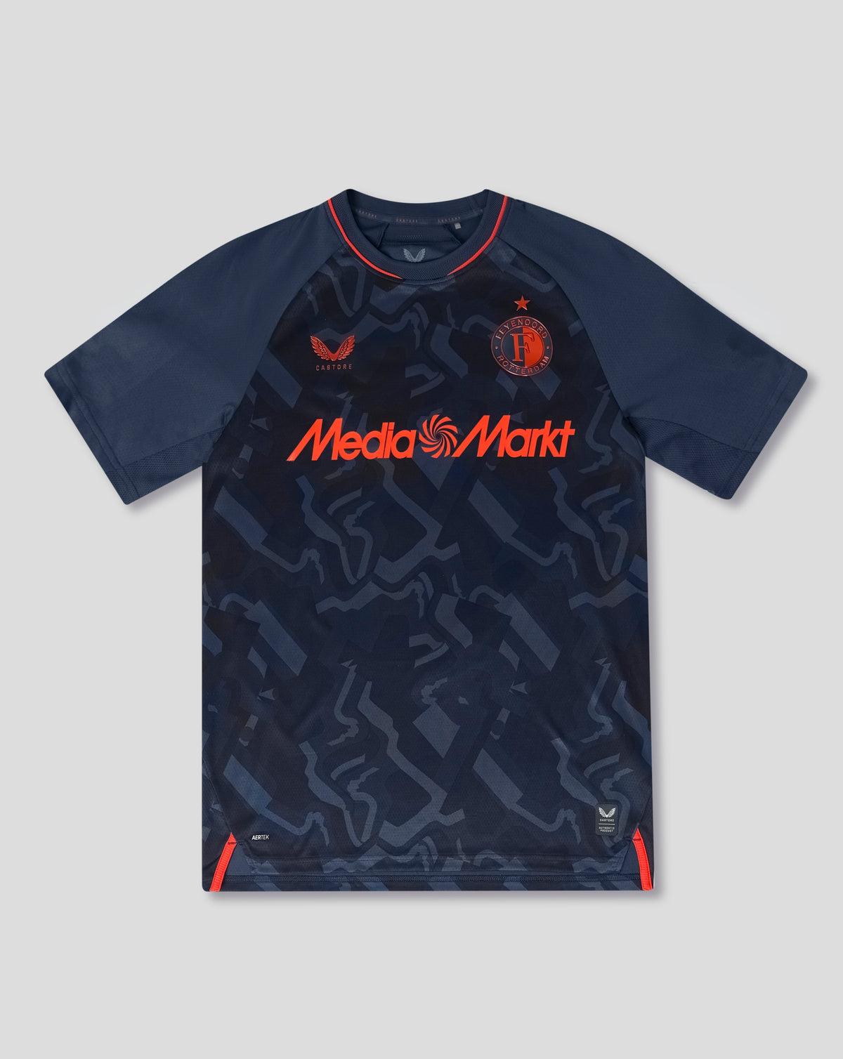 Feyenoord 2026-27 third jersey in navy with orange trim, geometric pattern, crest on left chest and Media Markt across front