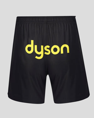 Black athletic shorts featuring a bold yellow 'dyson' logo printed across the front, displayed against a neutral light gray background.