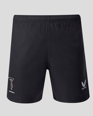 Black shorts with brand logos on a light gray background