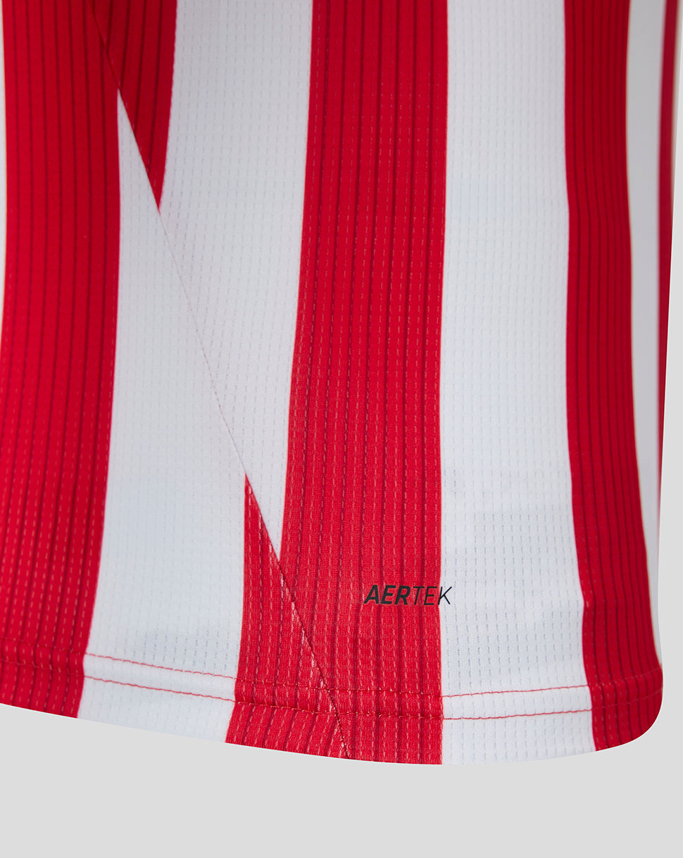 Close up of red and white striped Athletic Club home shirt fabric with AERTEK badge