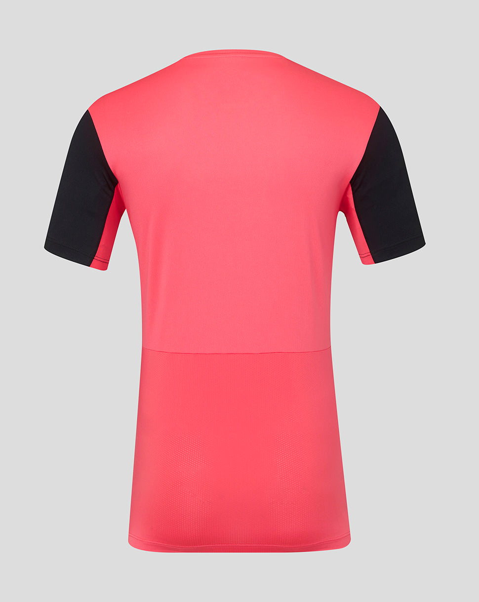 Pink and black short-sleeve shirt on a gray background