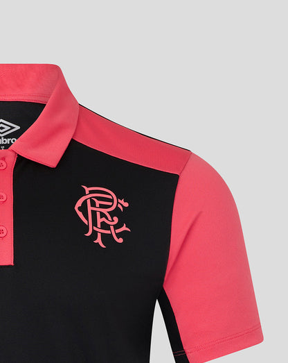 Black and red polo shirt with a logo on a light gray background