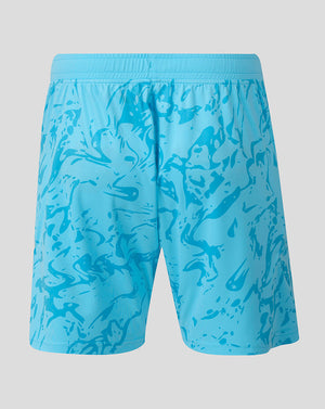Back view of light blue FC Twente goalkeeper shorts with an abstract pattern and crest on the left leg.