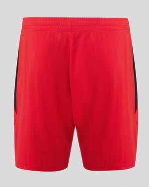 Back view of red Athletic Club shorts with a black side panel