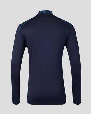 A dark navy long-sleeve athletic top shown from the back, featuring subtle tonal wave patterns and a subtle blue patterned collar and shoulder details, set against a solid light gray background.