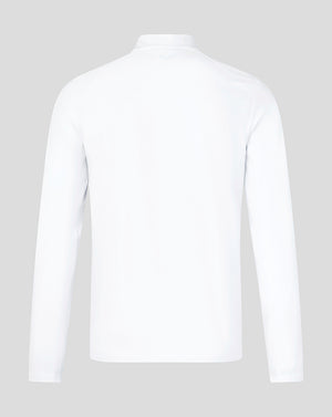 White long-sleeve shirt on a light gray background