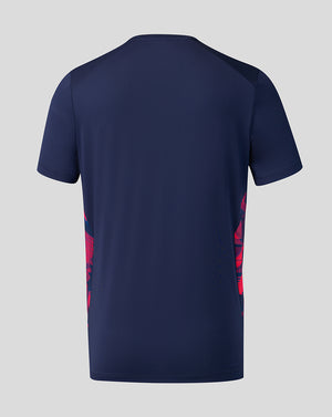 Navy blue t-shirt with red graphics on a light gray background