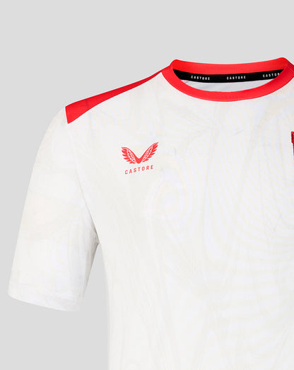 Shoulder and neckline close-up of white FC Twente shirt with red trim and crest.