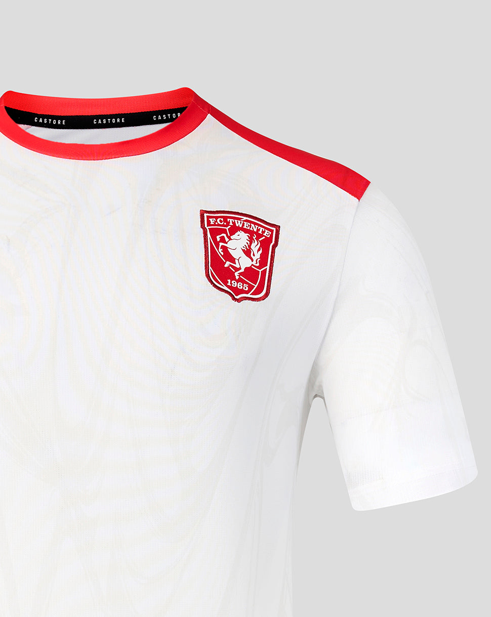 Front view of white FC Twente 26/27 matchday junior shirt with red crest on the chest and red collar trim