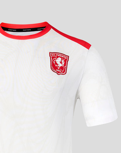 Front view of white FC Twente 26/27 matchday junior shirt with red crest on the chest and red collar trim