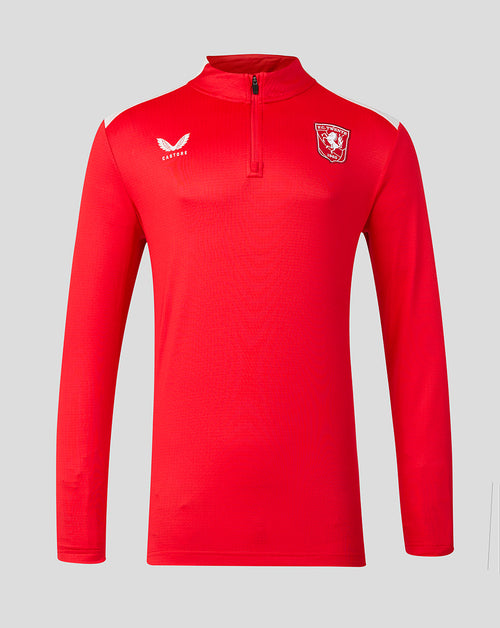 Front view of red FC Twente 26/27 Matchday Midlayer with quarter zip and white shoulder panels, crest on chest.