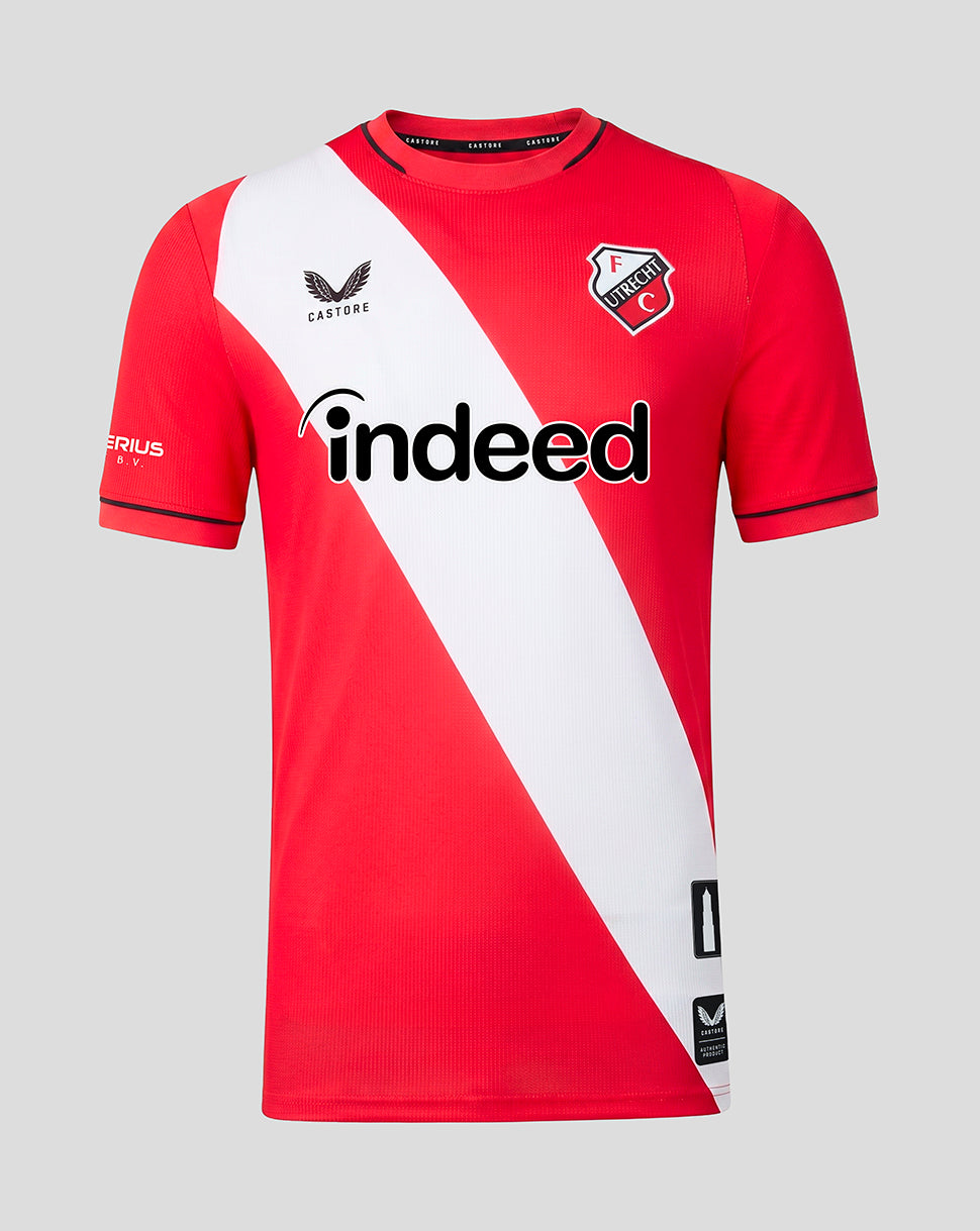 FC Utrecht 26/27 home shirt in red with diagonal white sash and sponsor logos.